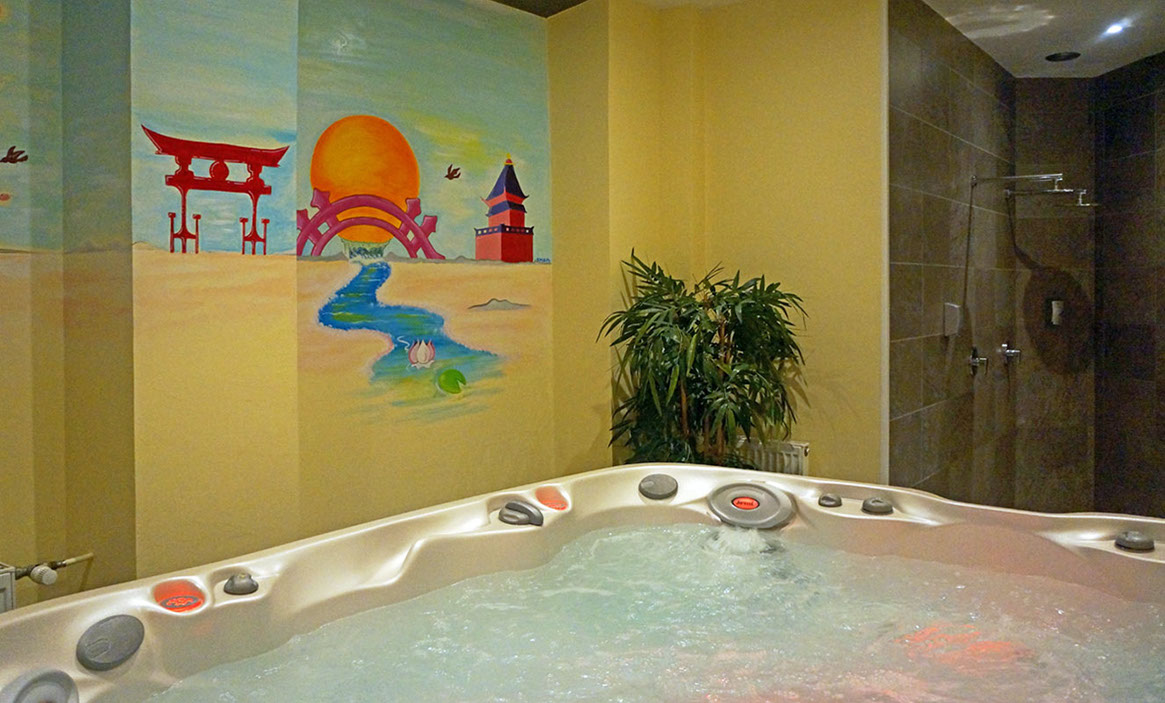 Jacuzzi spa massage Annecy Haute Savoie Seynod Spa très bien situé proche du centre ville d'Annecy, stationnement gratuit parking, jacuzzi 6 personnes soins et bien être massage maud armand